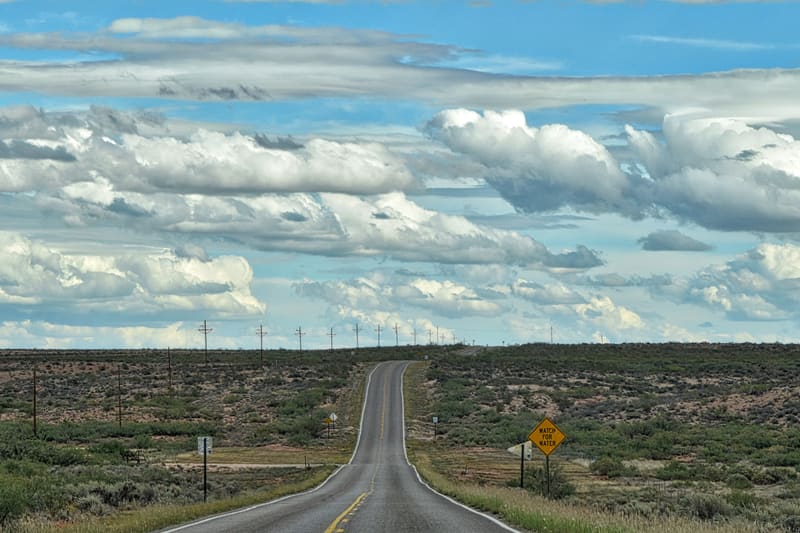 Rural highway through the New Mexico desert landscape